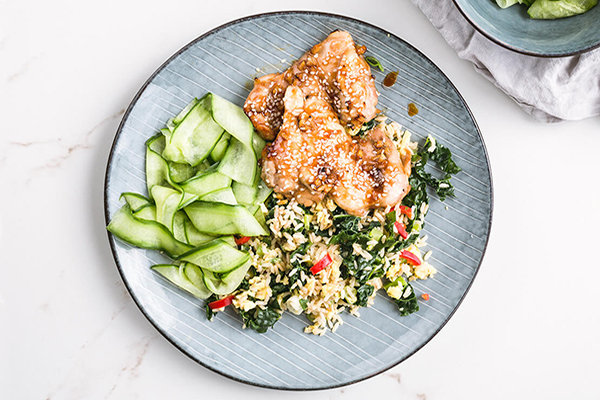 Sticky sesame chicken, egg & cavolo rice