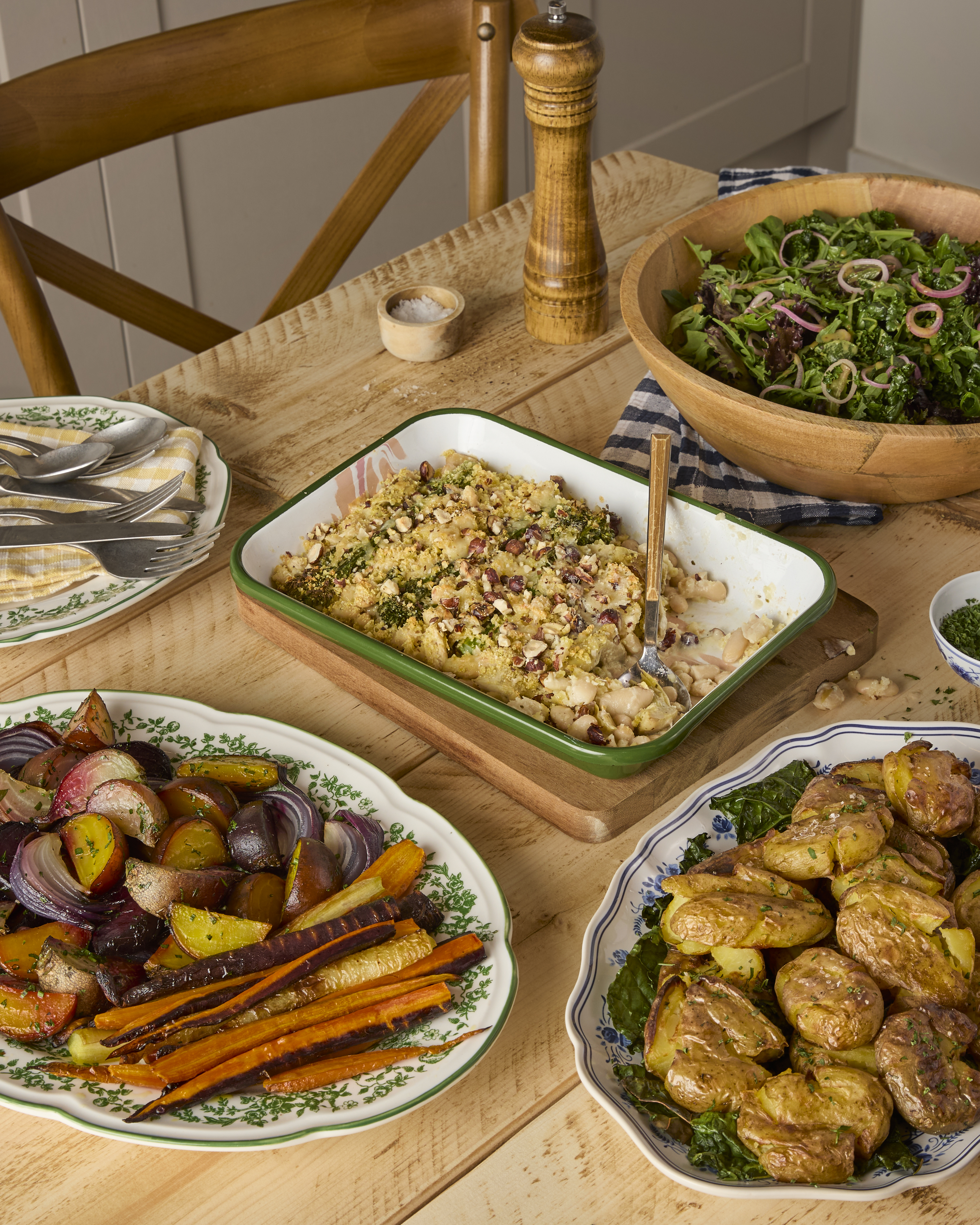 Tenderstem, Artichoke & Cheddar Gratin with golden potatoes and skin-on seasonal trimmings