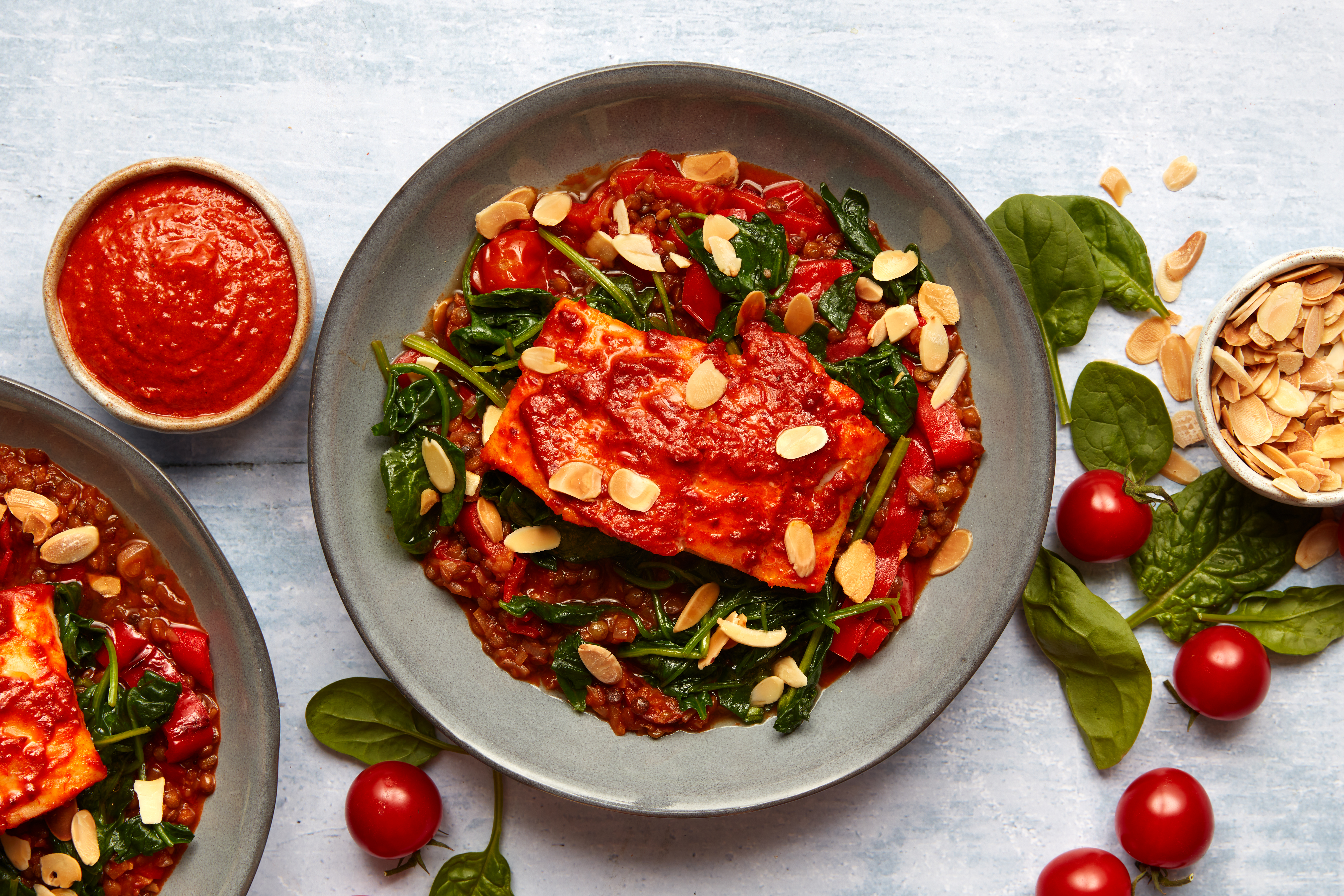 Baked romesco pollack with sweet lentil stew