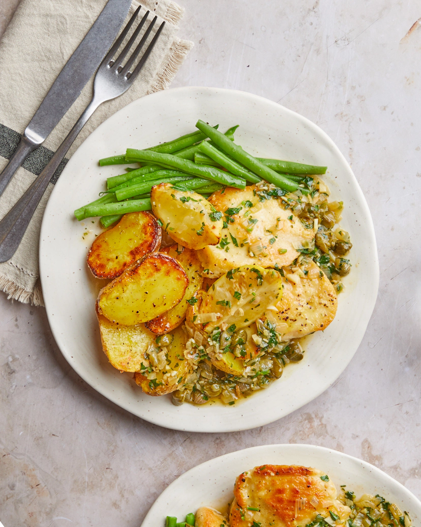 Tender free-range British chicken breast, pan-fried till golden. Paired with irresistibly crispy potatoes and fresh green beans. Pour over a simple sauce of olives and parsley. It's a healthy, homemade dinner – Italian-style!