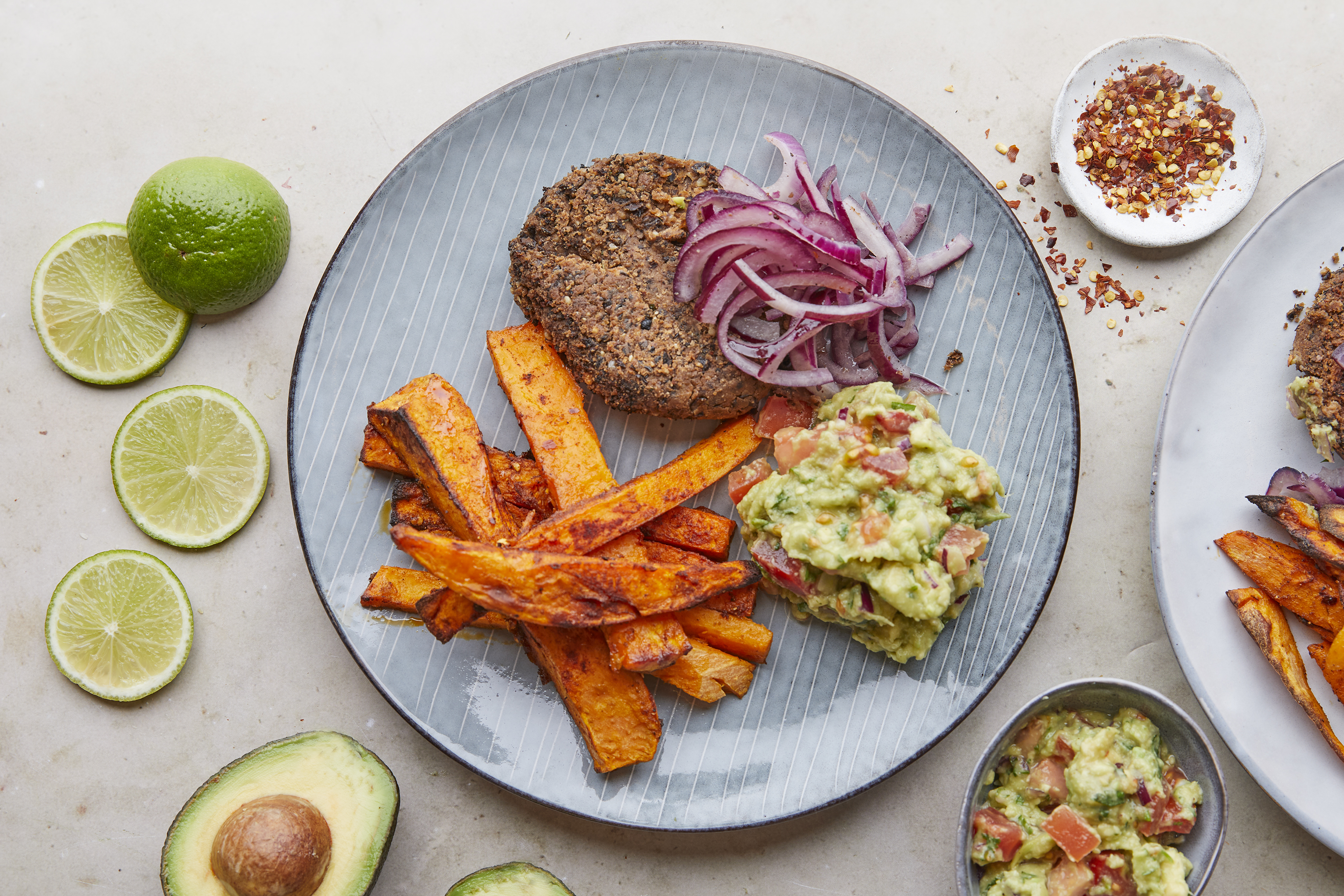 Black bean 'cheese' burger with sweet potato fries