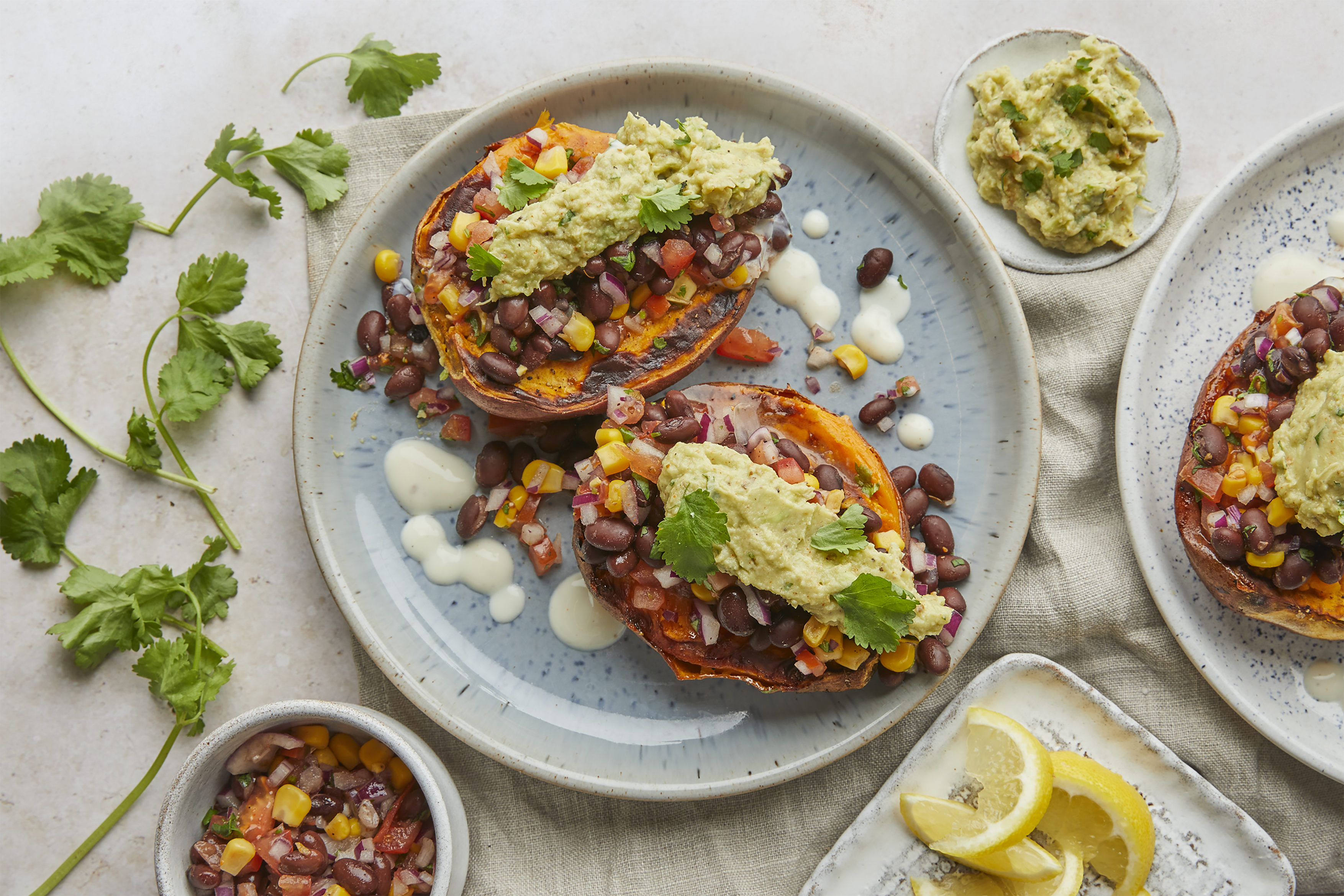 Sweet potatoes stuffed with bean & corn salsa