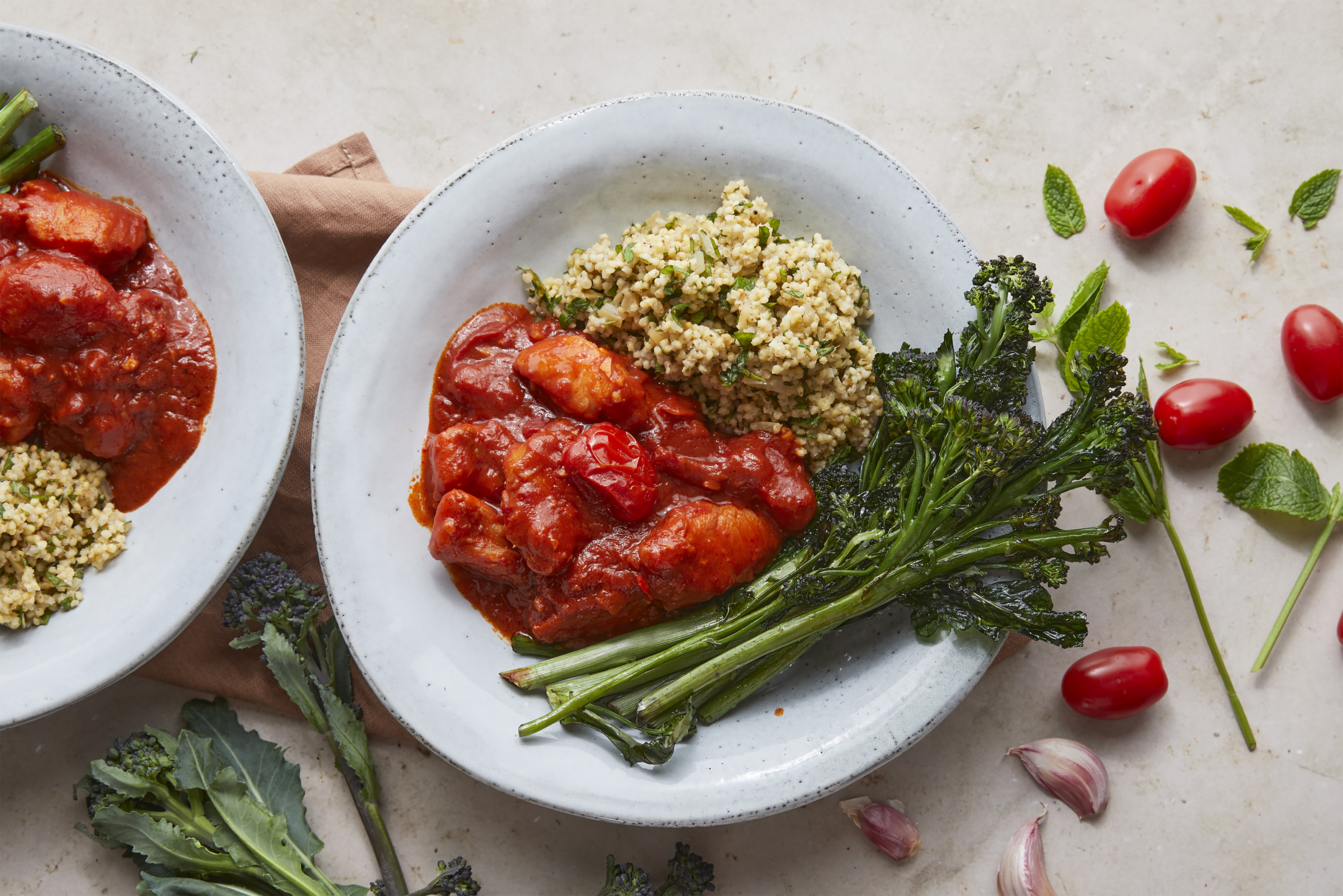 Tomato harissa monkfish with herby millet
