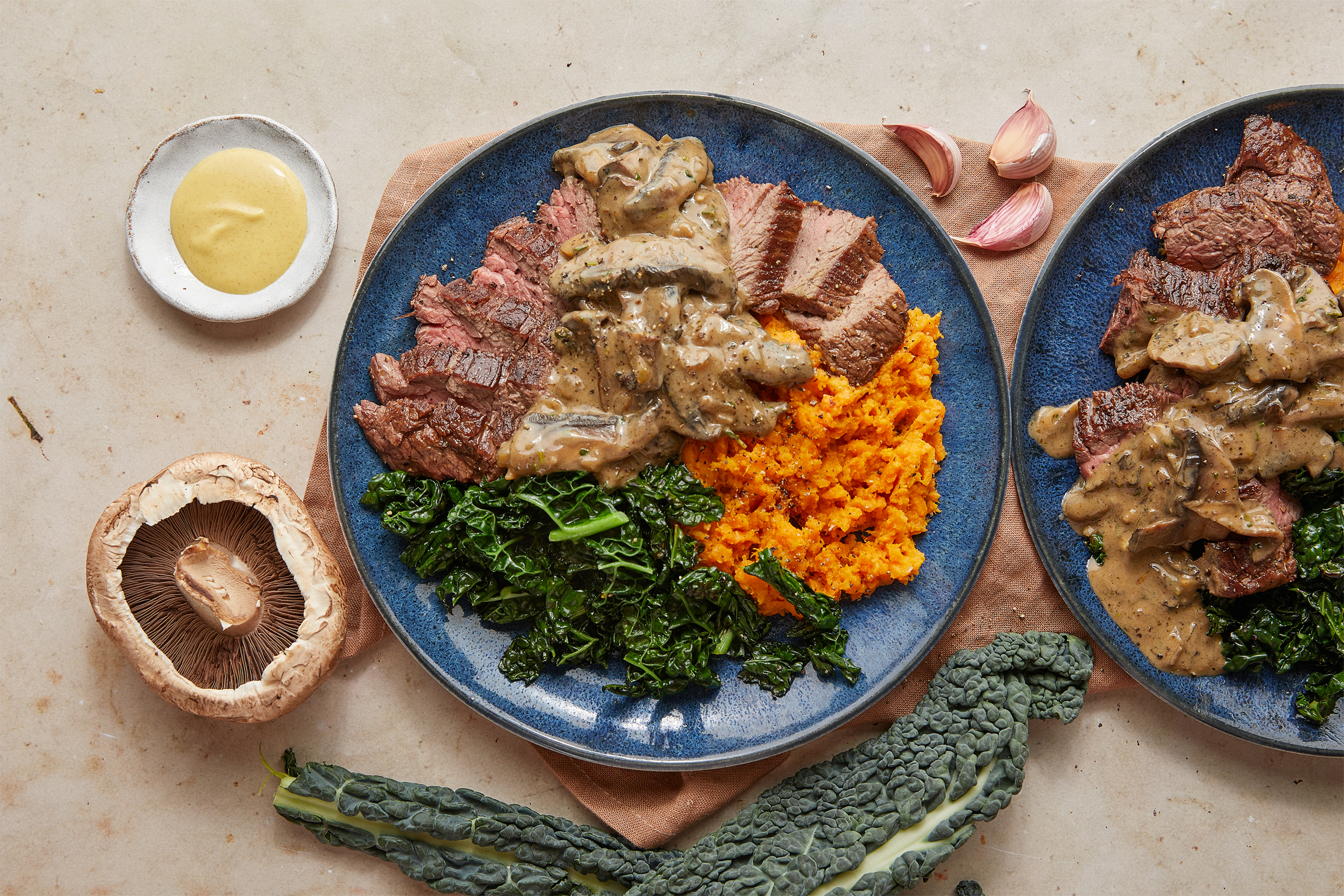 Steak, creamy mushroom sauce & sweet potato mash