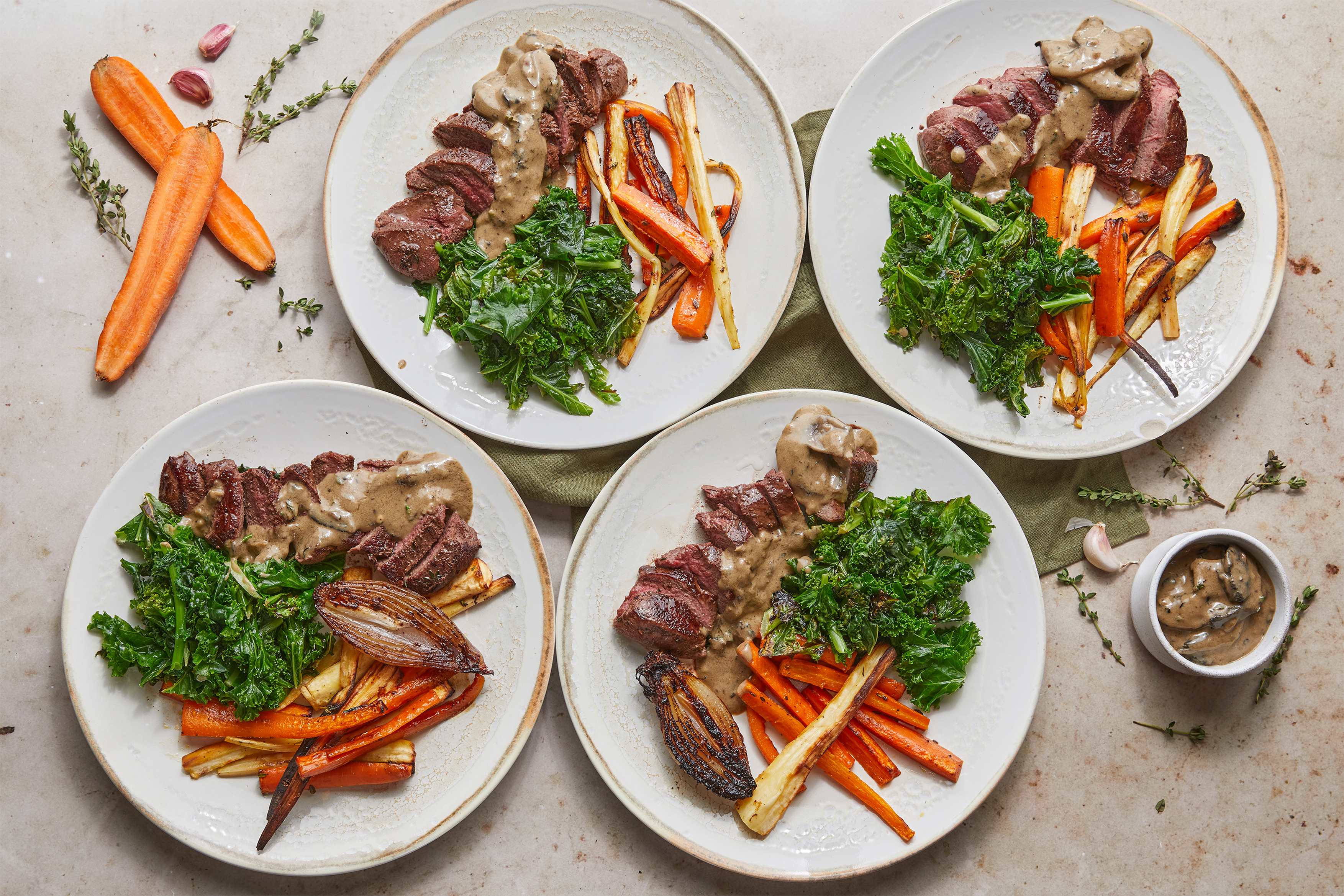 Venison, creamy mushroom sauce & roasted carrots