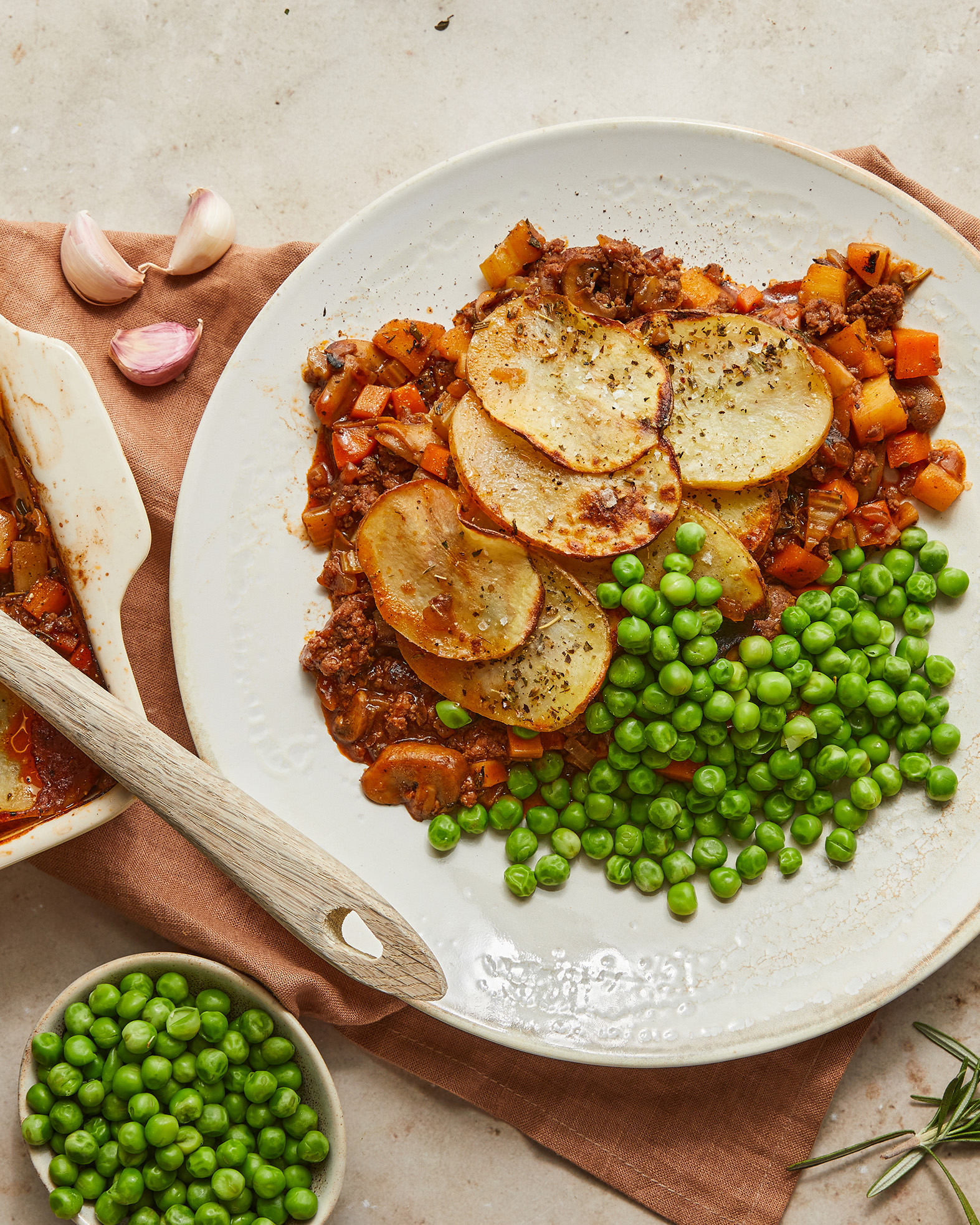 Slow-cooked Venison Hot Pot with Potato Topping, Mushrooms & Peas