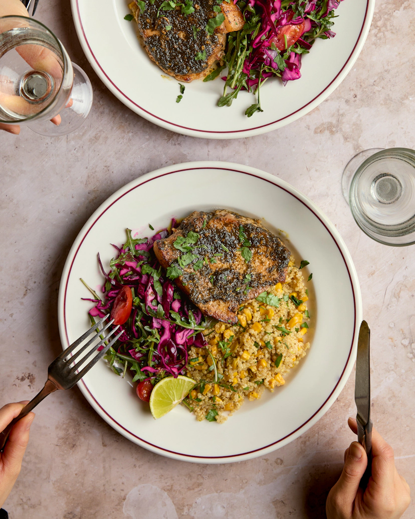 Chermoula is a crackin’ marinade for free-range British pork steaks, cooked until golden brown and juicy. Serve yours with fluffy quinoa packed with lime zest and charred sweetcorn. A vibrant pickled cabbage salad, with leafy rocket and juicy tomato, brings in the freshness. A true feast!