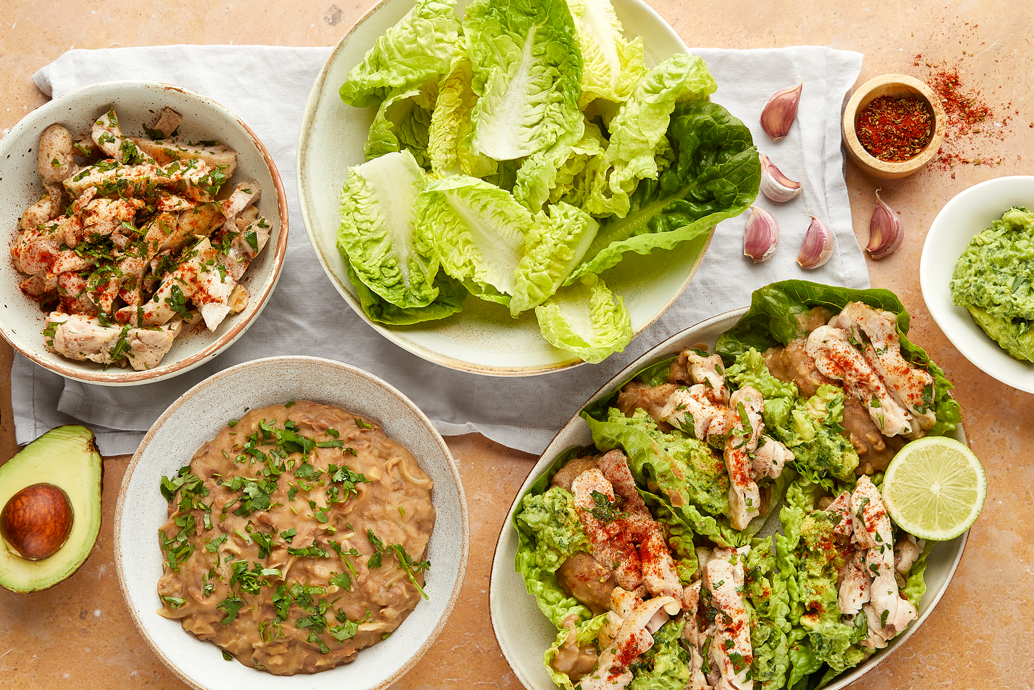 Chicken, refried beans & guasacaca lettuce wraps