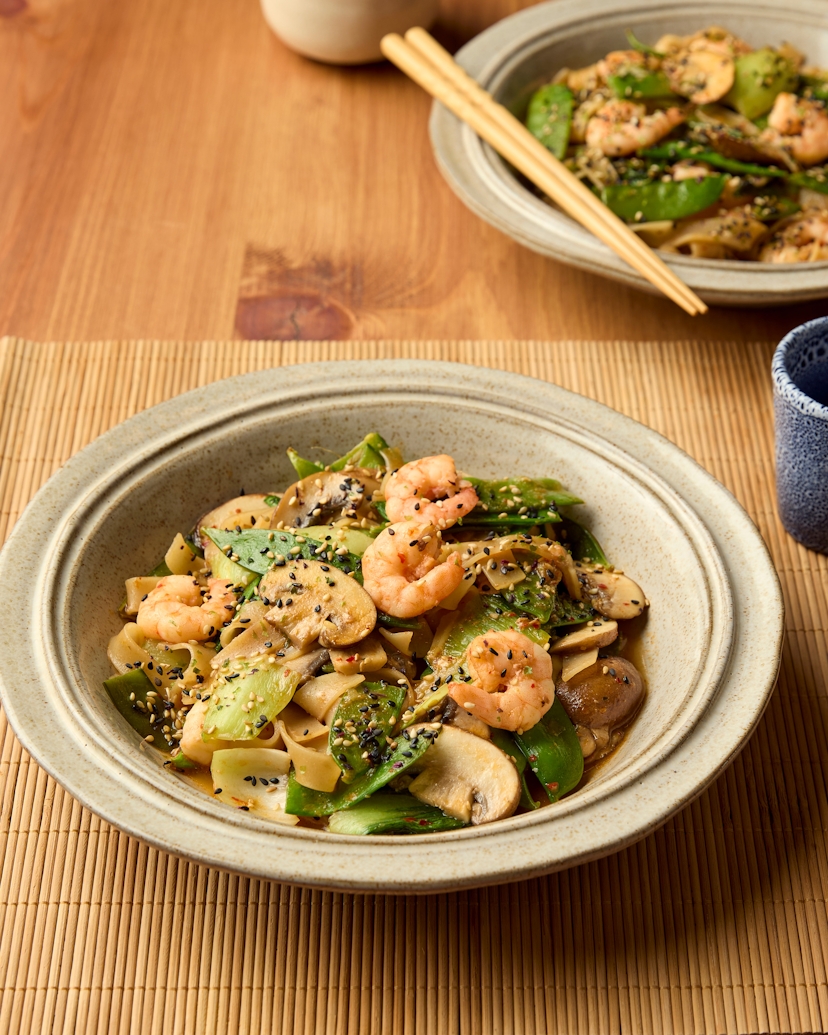 This stir-fry will be on your table in a flash, making it perfect for busy weeknights! Simply sizzle responsibly-sourced king prawns with vibrant mangetout and leafy pak choi. Toss through the noodles and a more-ish, sweet 'n salty miso honey sauce. Grab your chopsticks and dig in!